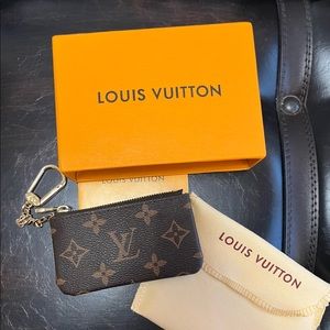 Louis Vuitton coin or card pouch.